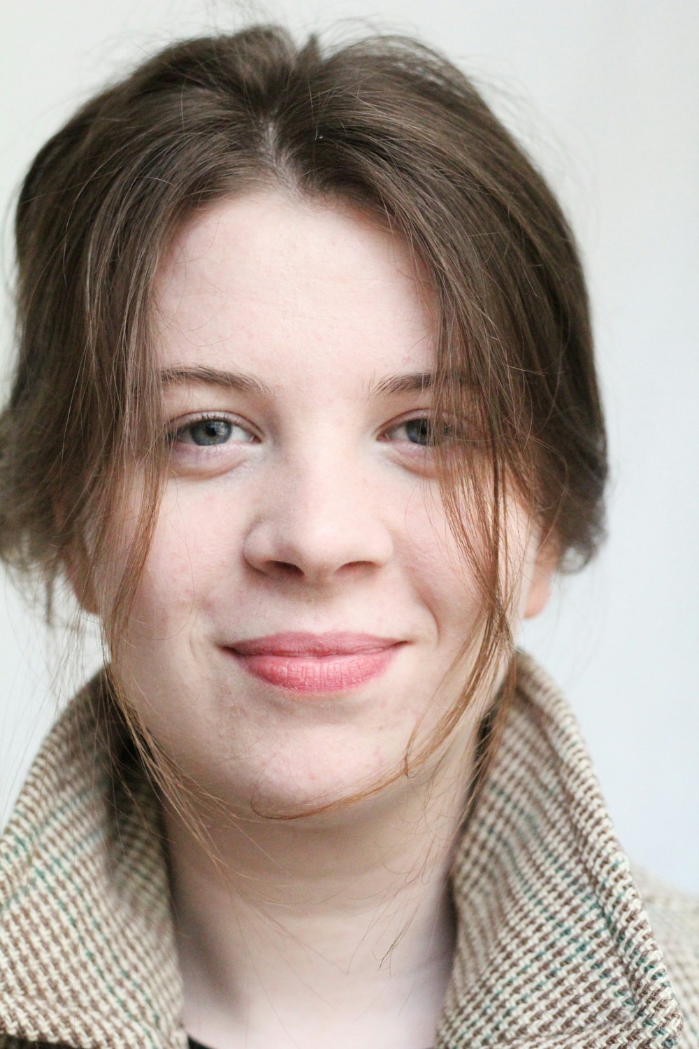 woman in white and black knit shirt