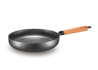 black frying pan on white surface