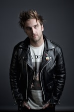 man in black leather jacket