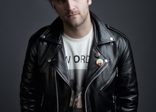 man in black leather jacket