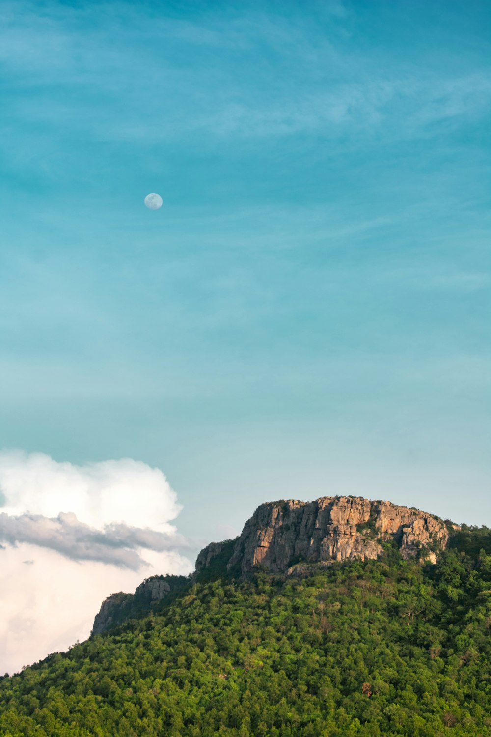 green and brown mountain under blue sky during daytime