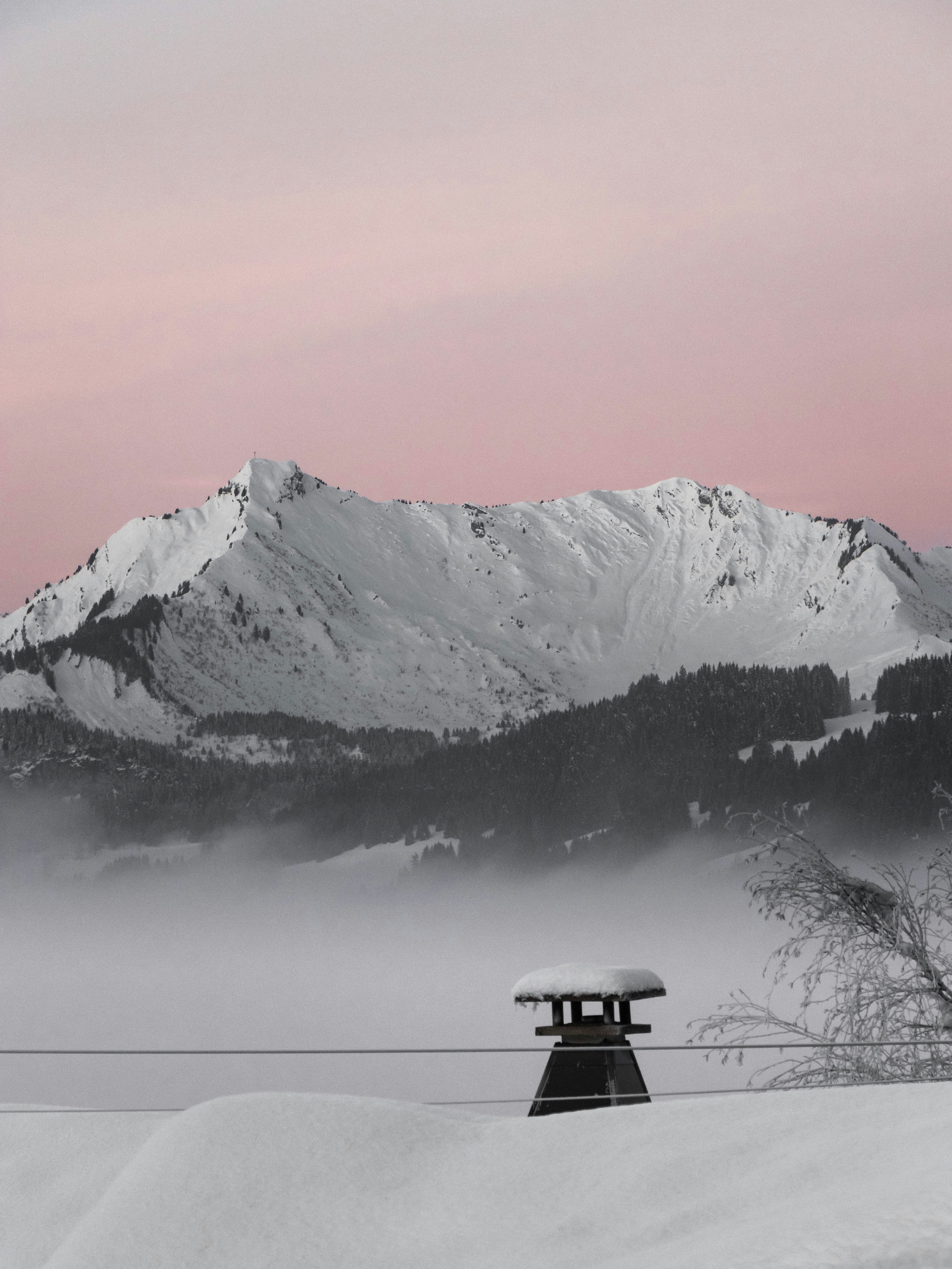 snow covered mountain during daytime