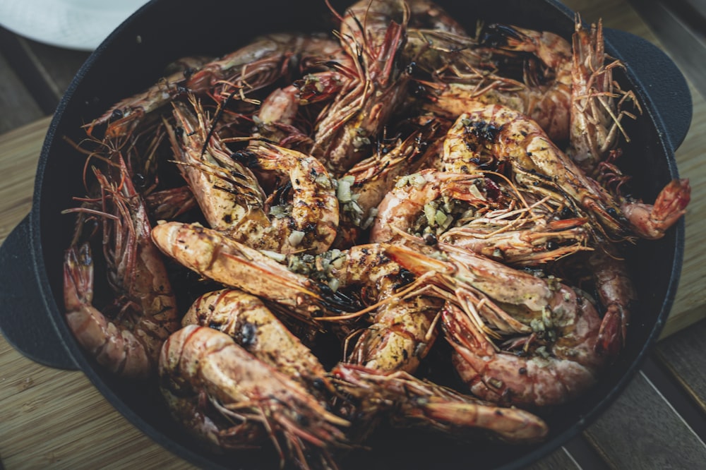 fried shrimps on black round plate