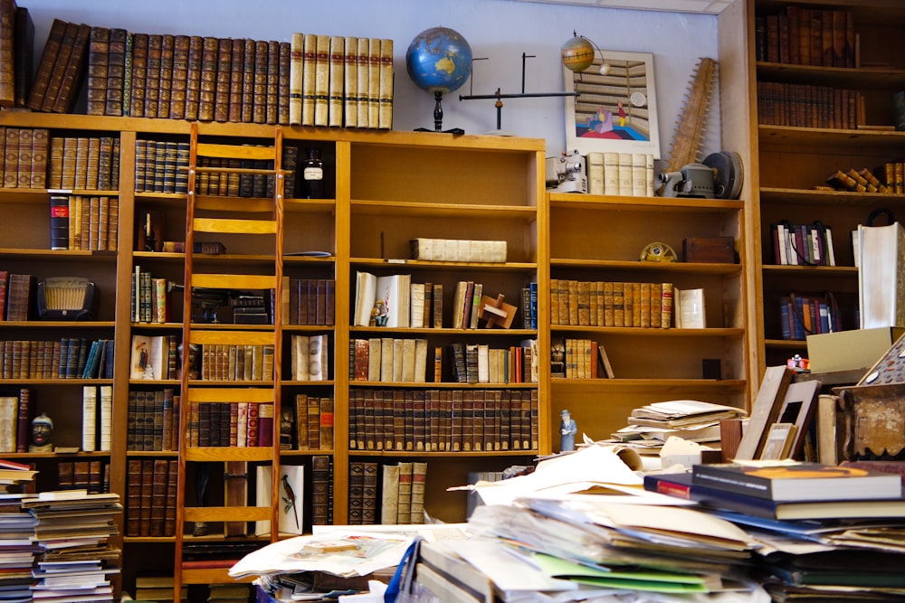 books on brown wooden shelf