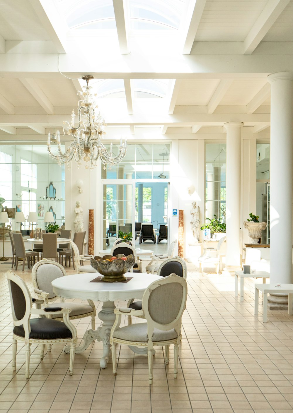 white and brown dining table and chairs set