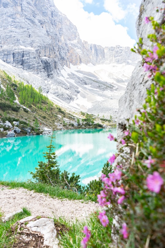 lake in the middle of rocky mountains in Sorapiss Italy