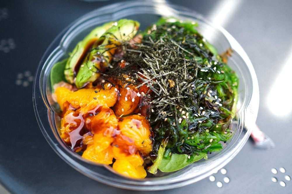 green vegetable salad on clear glass bowl