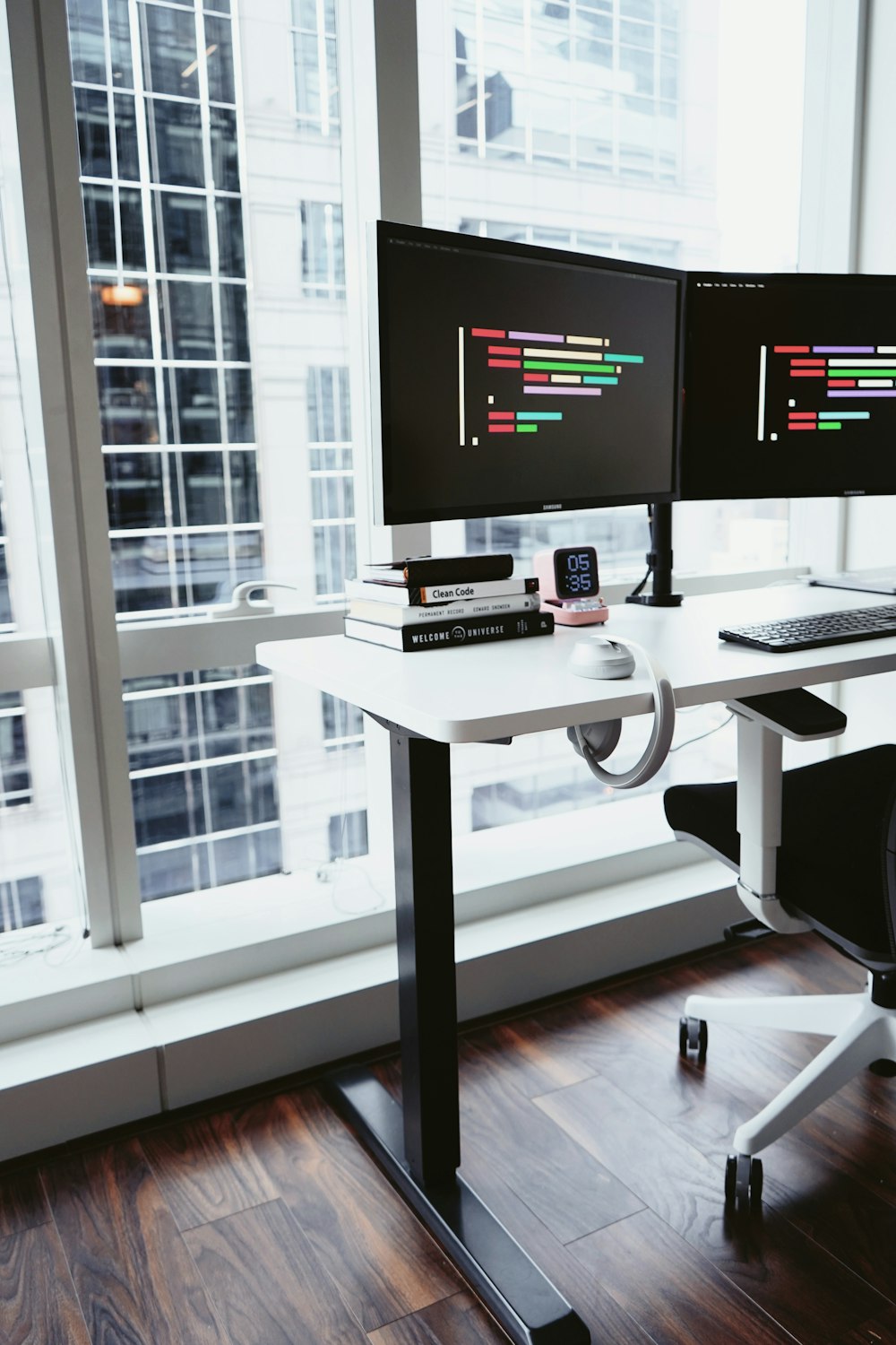 black flat screen tv on white wooden table