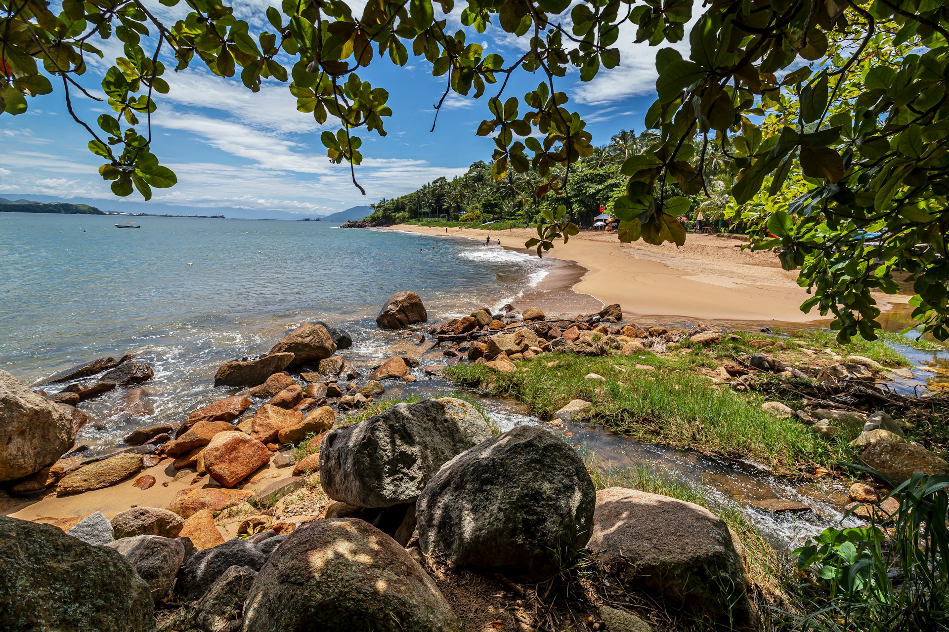 brown rocks on seashore during daytime