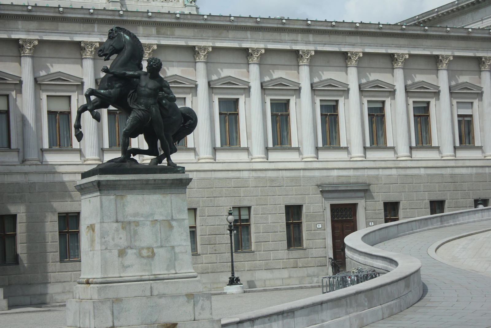 Government building with monumental statue — the architecture of public institutions