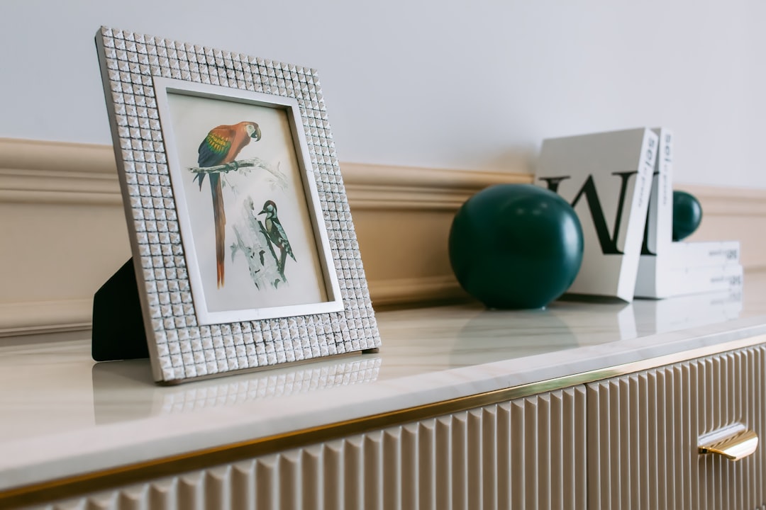 blue ball on white wooden shelf