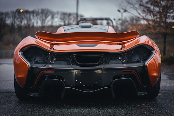 orange and black chevrolet camaro