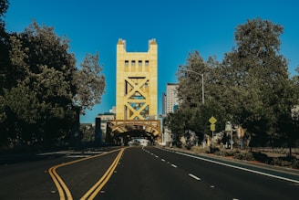 cars on road near building during daytime