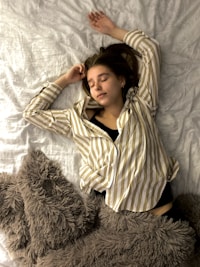 woman sleeping-subtitle-Prioritize Sleep-title-How to Get Lean Mass Body