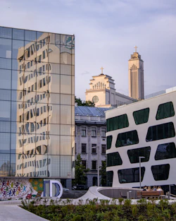 white concrete building with glass windows