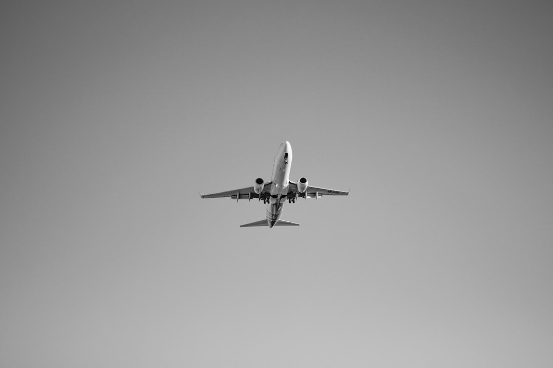 white airplane in mid air, Fly alone