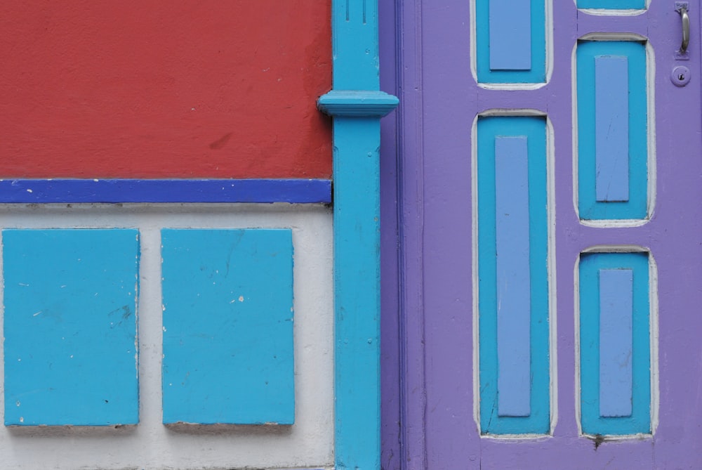 blue and red wooden door