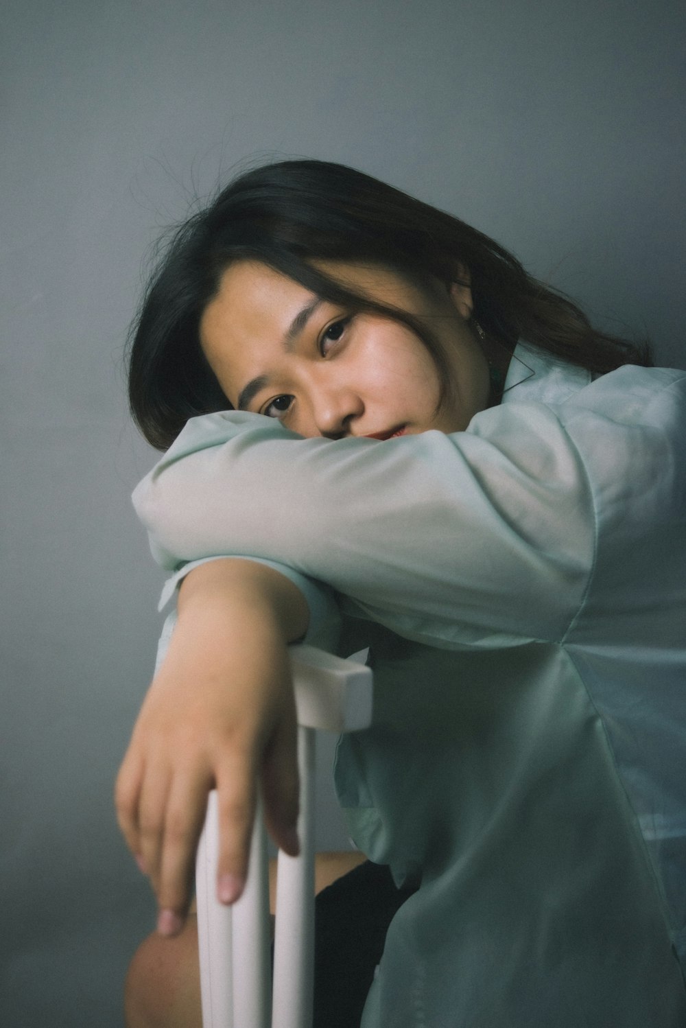 woman in white long sleeve shirt