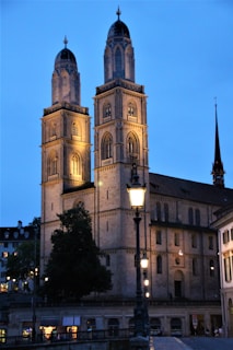 Historic Duomo di Milano bathed in warm afternoon light, reachable on foot.