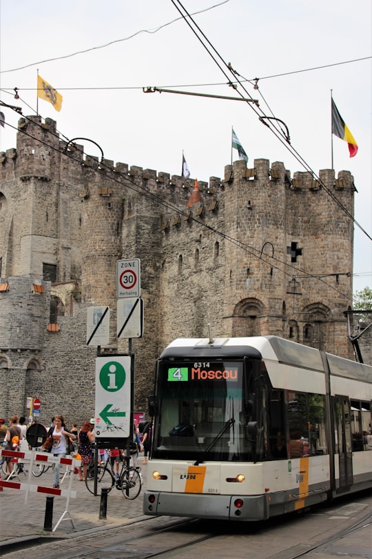 people standing near train during daytime in Gravensteen Belgium