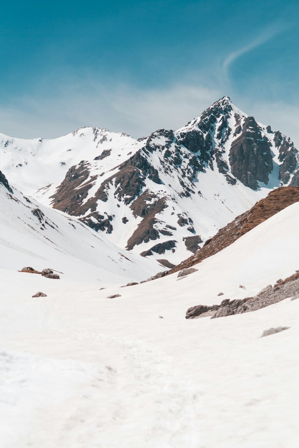 snow covered mountain during daytime