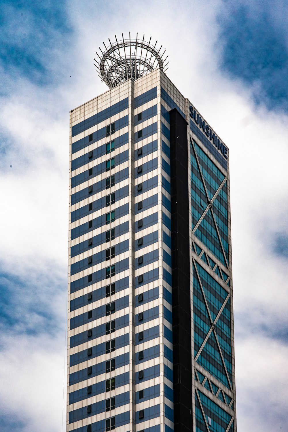 white and blue concrete building under blue sky