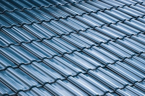 Close-up of a freshly sealed commercial roof with visible acrylic coating in Puerto Rico.