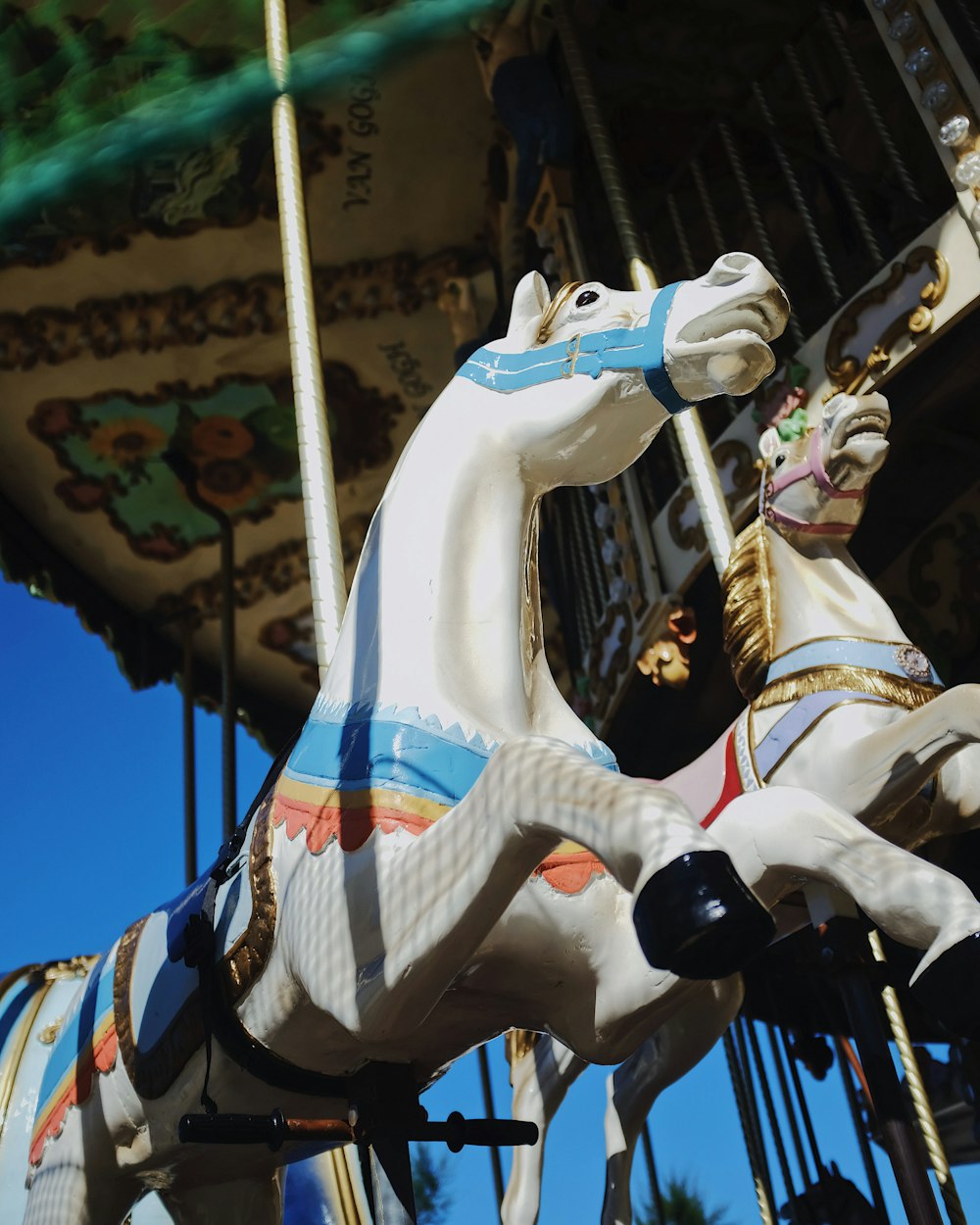 white blue and red horse carousel