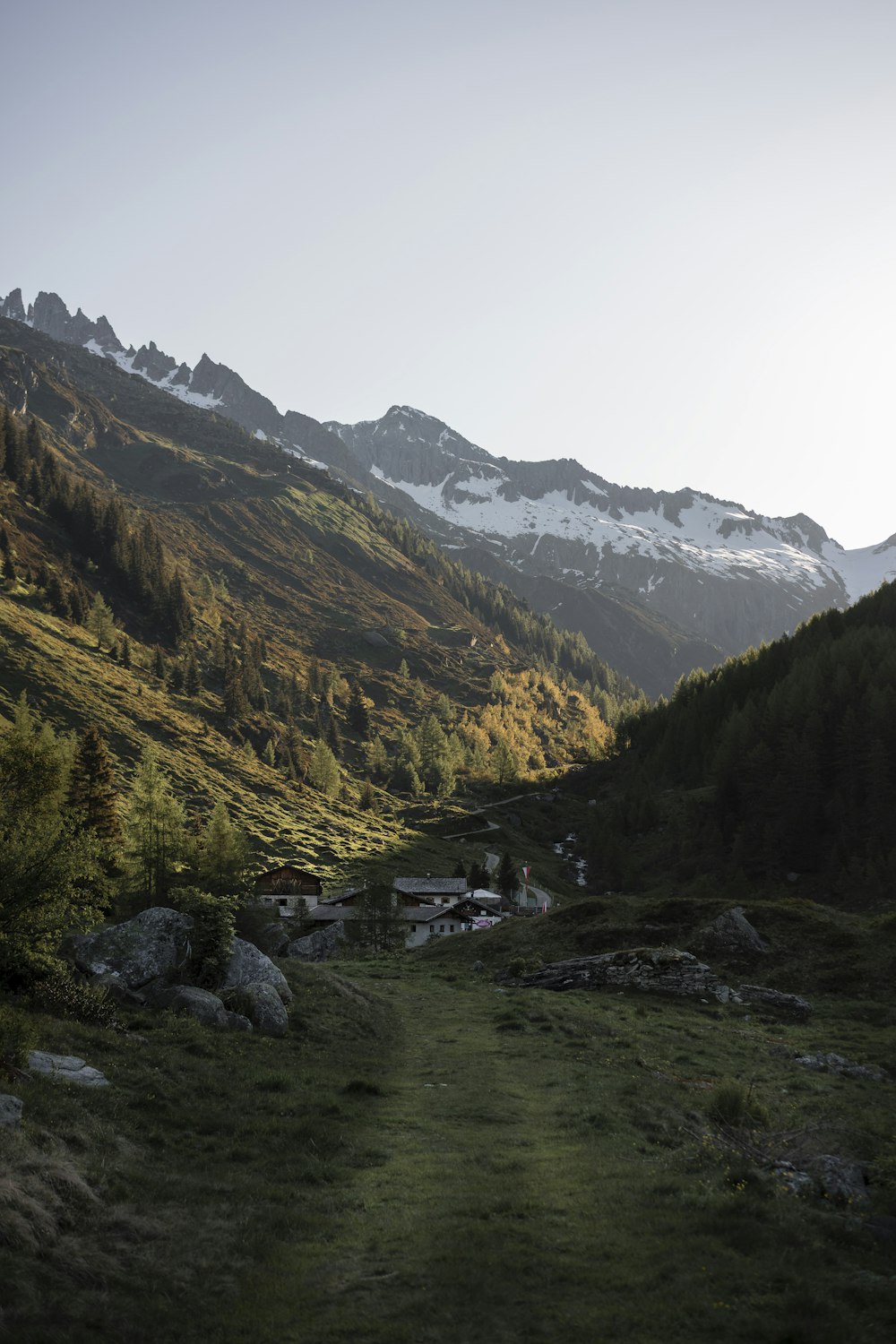 green and brown mountains under white sky during daytime