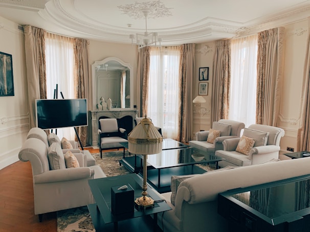 black flat screen tv on white wooden tv rack