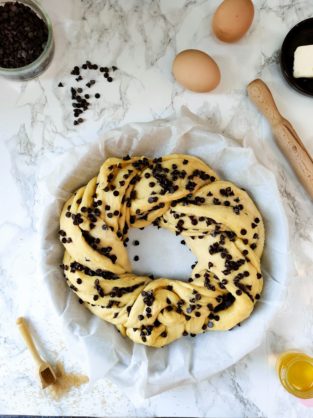 brown doughnut on white paper