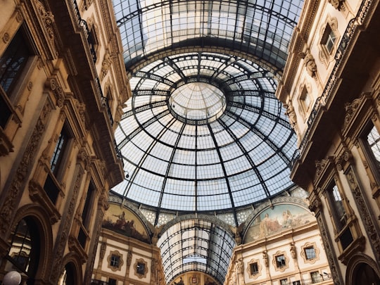 low angle photography of brown concrete building in Galleria Vittorio Emanuele II Italy