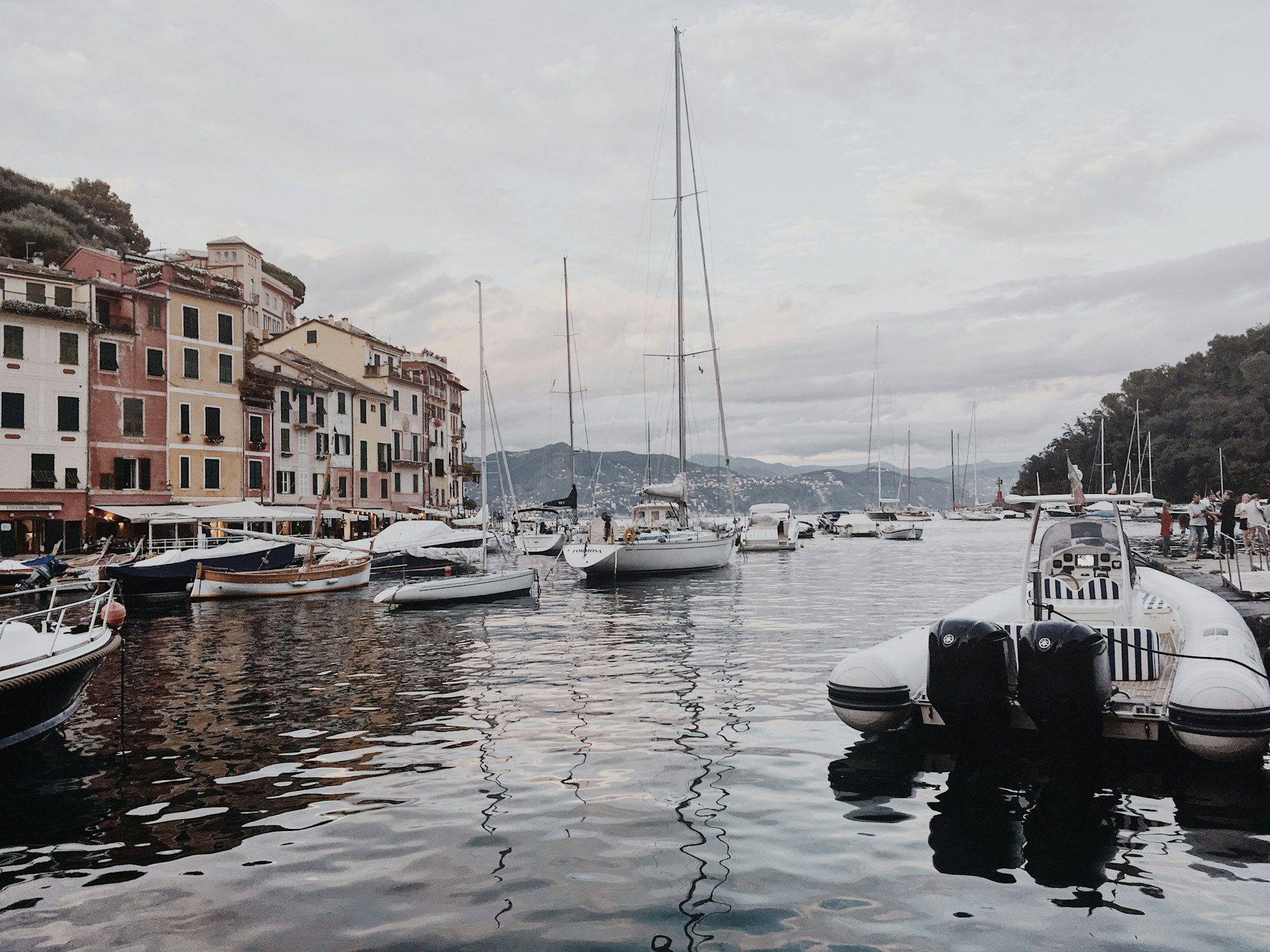 woman wearing yellow long-sleeved dress under white clouds and blue sky during daytime