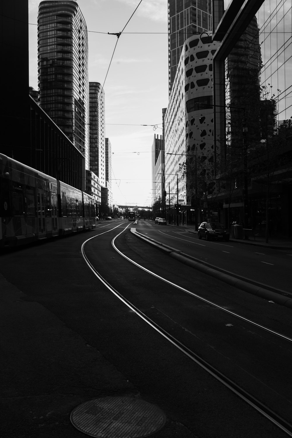 grayscale photo of city buildings