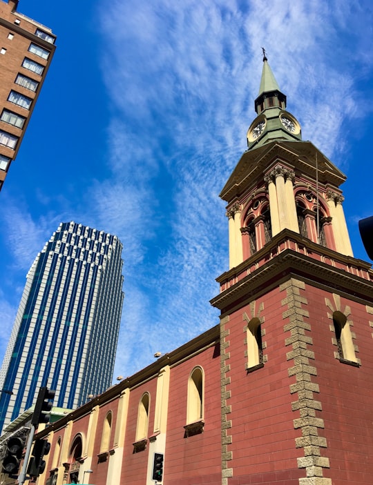 brown concrete building under blue sky during daytime in Café Vienés Santiago Chile