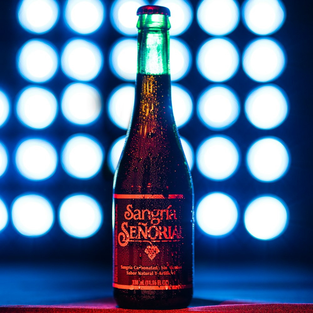 red wine vinegar bottle on red table