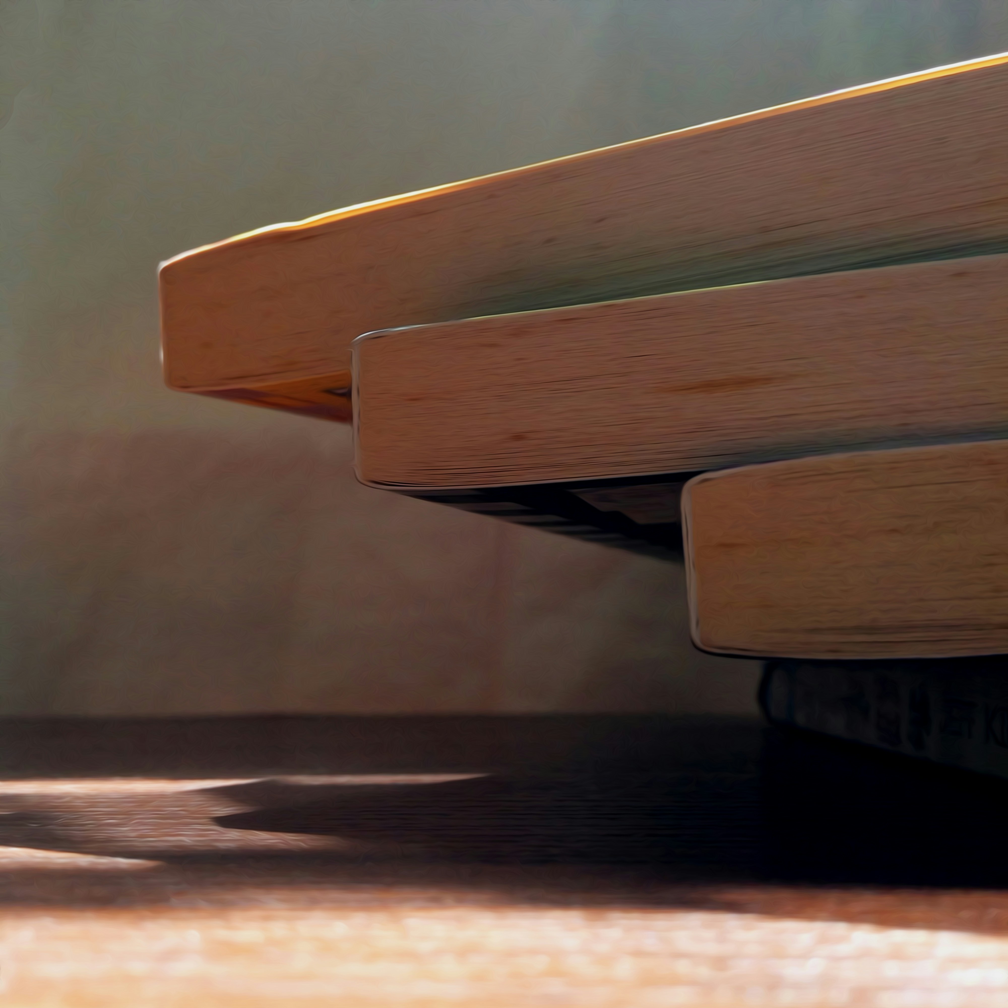 Open books on wooden table with warm ambient light
