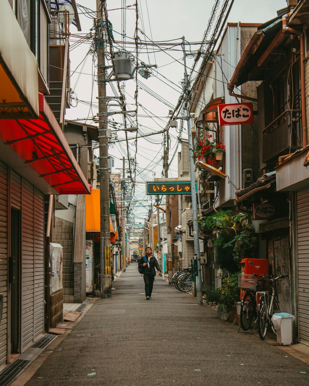 people walking on sidewalk during daytime