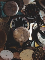 A collection of unique watch dials showcasing diverse designs and complications.