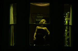 Smart textile fabric with embedded sensors displayed on a mannequin under soft lighting