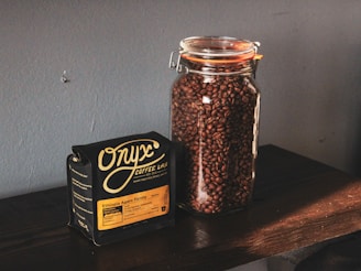 black and brown labeled jar