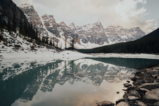 snow covered mountain during daytime in Moraine Lake Canada