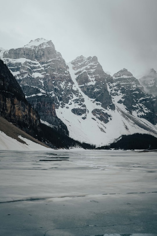 snow covered mountain during daytime in Moraine Lake Canada