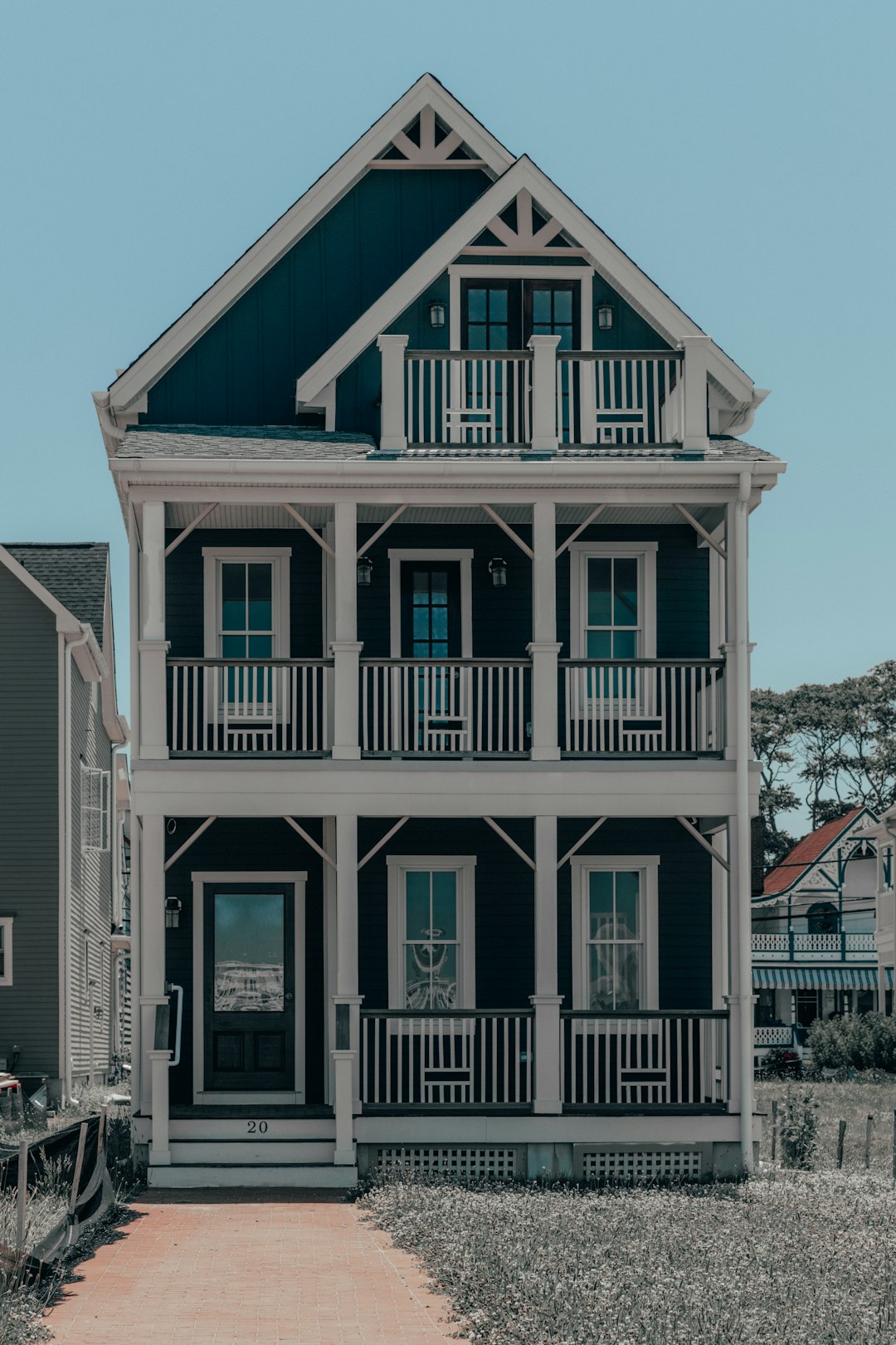 white and black wooden house during daytime