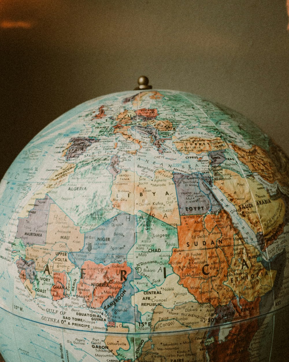 blue and brown desk globe