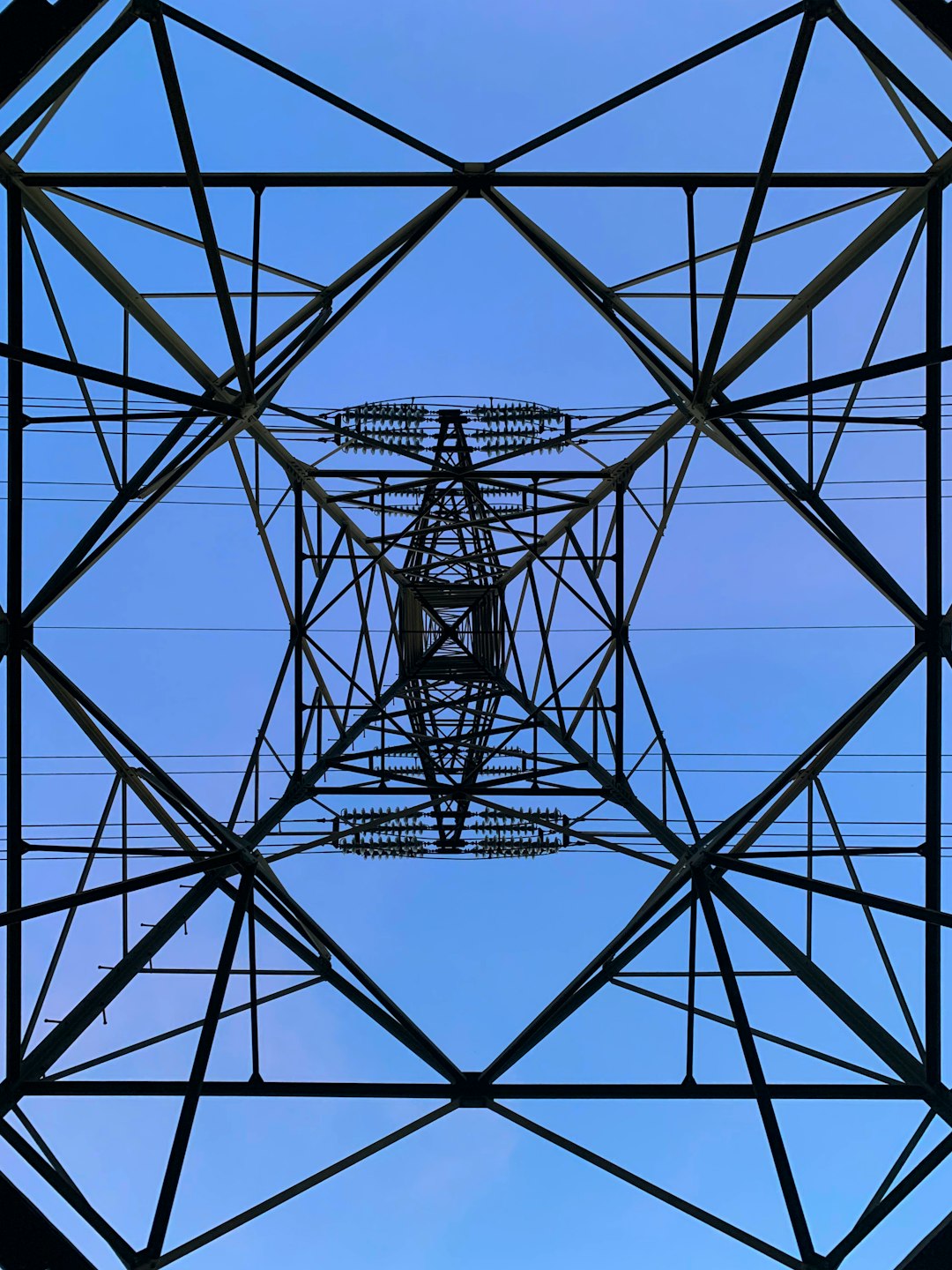 Wire tower for electricity. Architecture from below. High voltage.