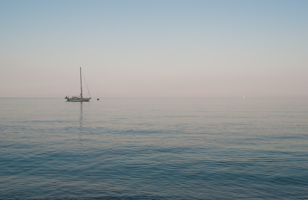 sailboat on sea during daytime