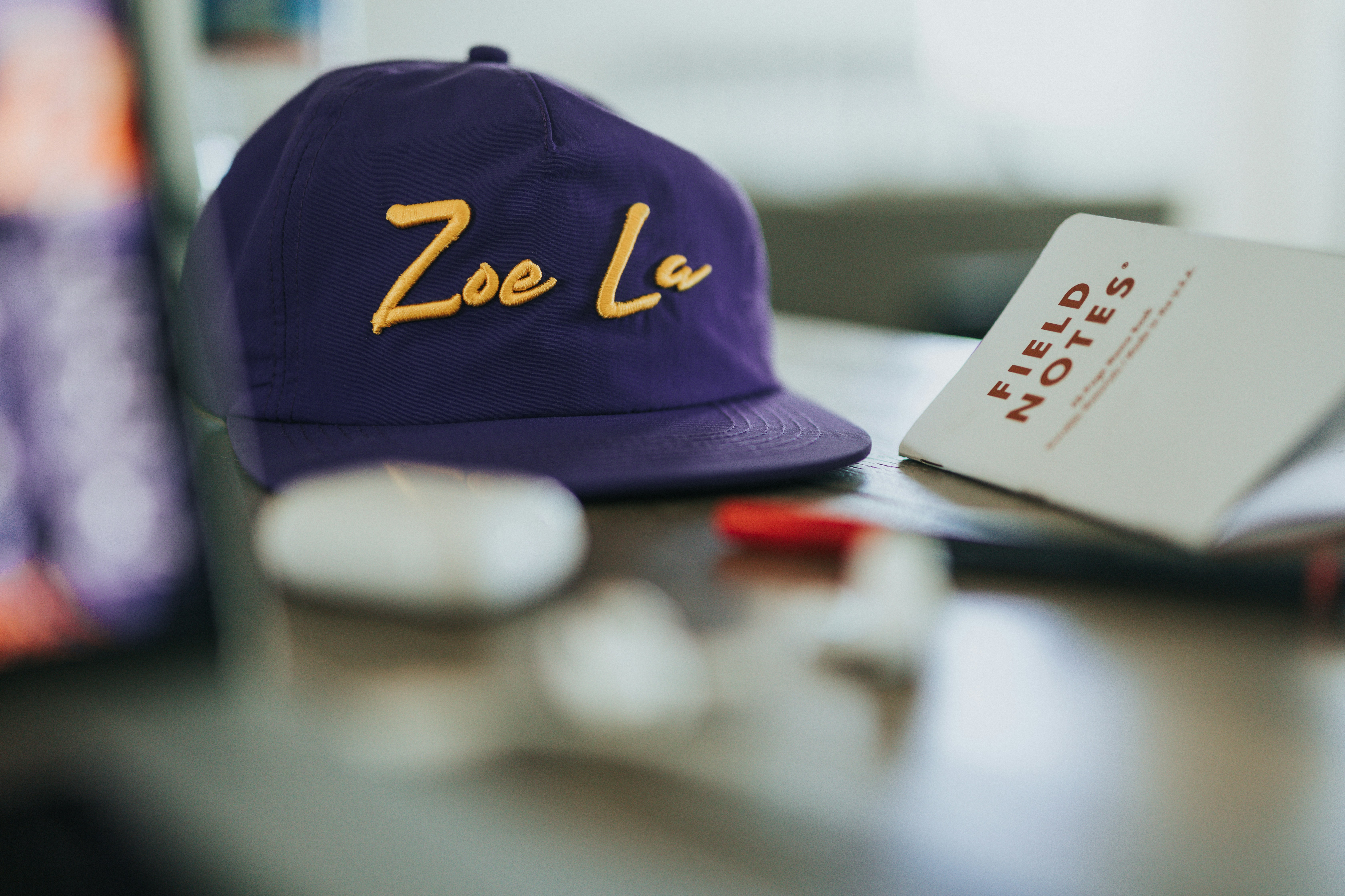 a purple hat sitting on top of a table