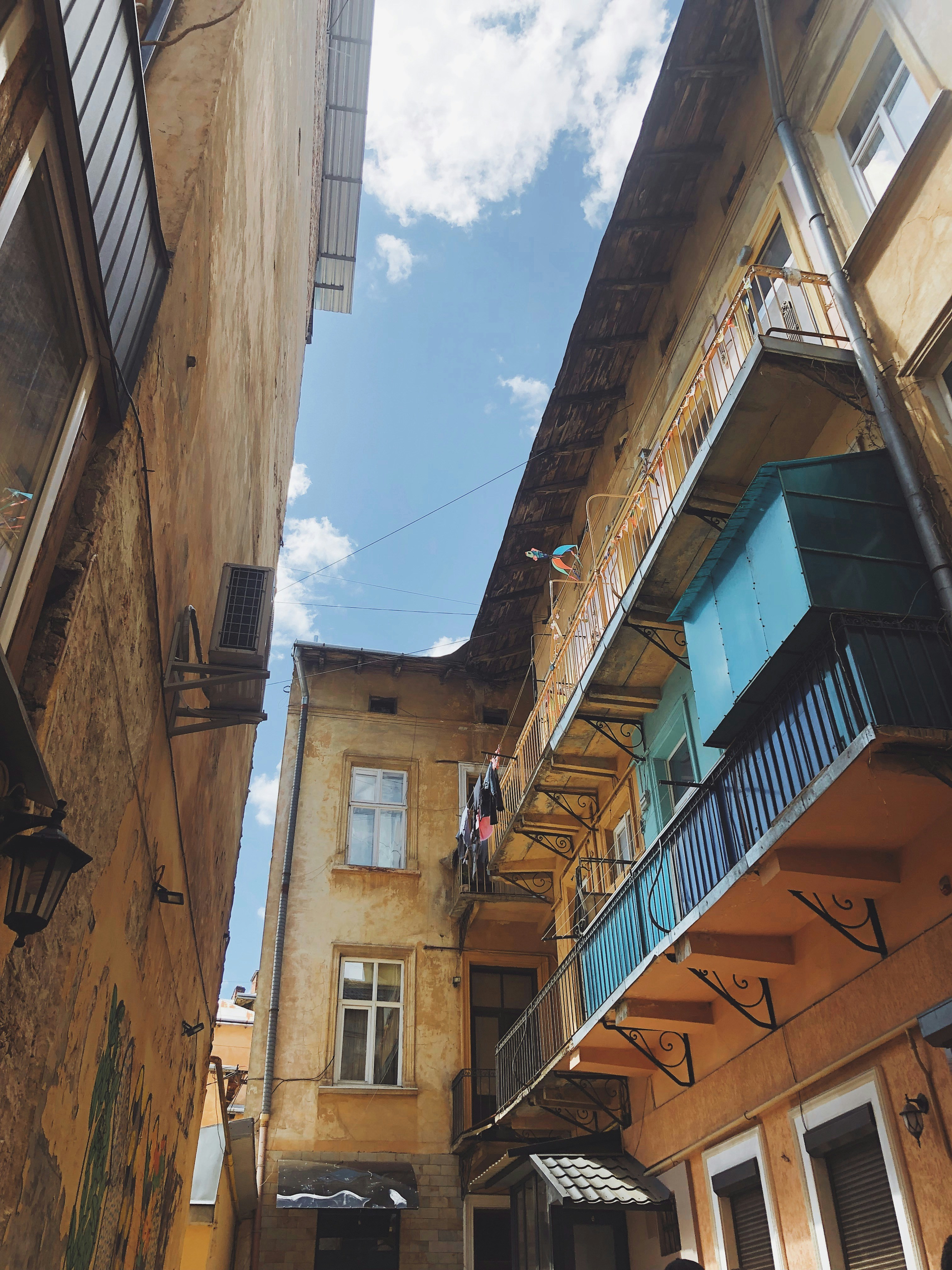 brown concrete building under blue sky during daytime