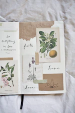 Close-up of hands journaling with floral decorations around, symbolizing personal growth and femininity